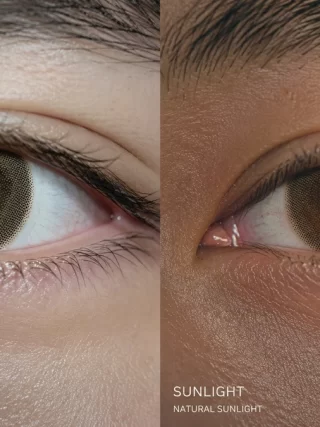 Ultra-realistic split-screen comparison of a colored contact lens under harsh bathroom lighting versus natural ambient window light.